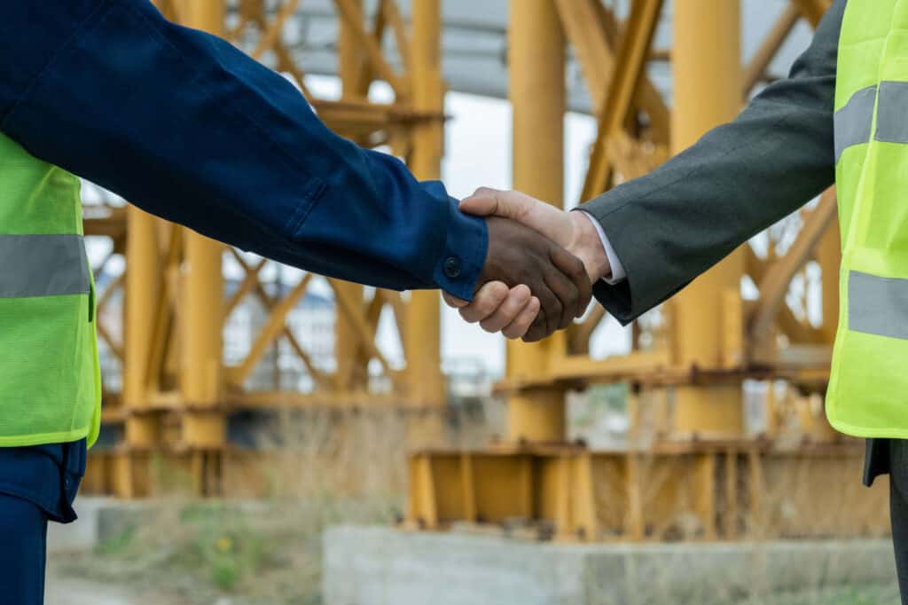 handshake of engineers of african and caucasian et 2021 09 24 03 43 56 utc